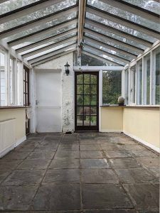 old conservatory walls and door garage side